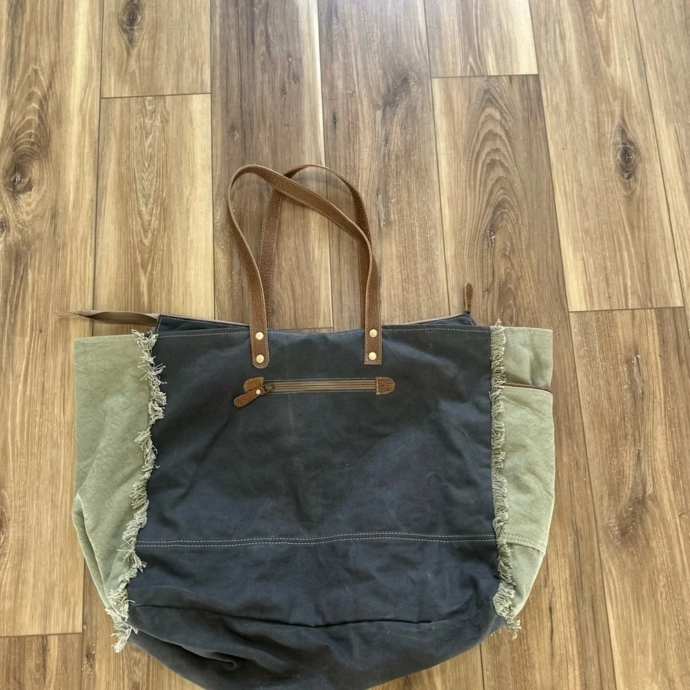 Myra Bag upcycled canvas & cowhide weekender bag